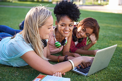 Buy stock photo Grass, laptop or students in park at college, campus or  together with online course, smile or group. University, relax or happy friends bond with support, teamwork or diversity in education on field