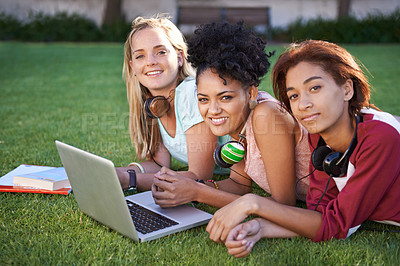Buy stock photo Portrait, laptop or friends on grass at college, campus or  together with online course, smile or group. University, relax or happy students bond with support, teamwork or diversity in education