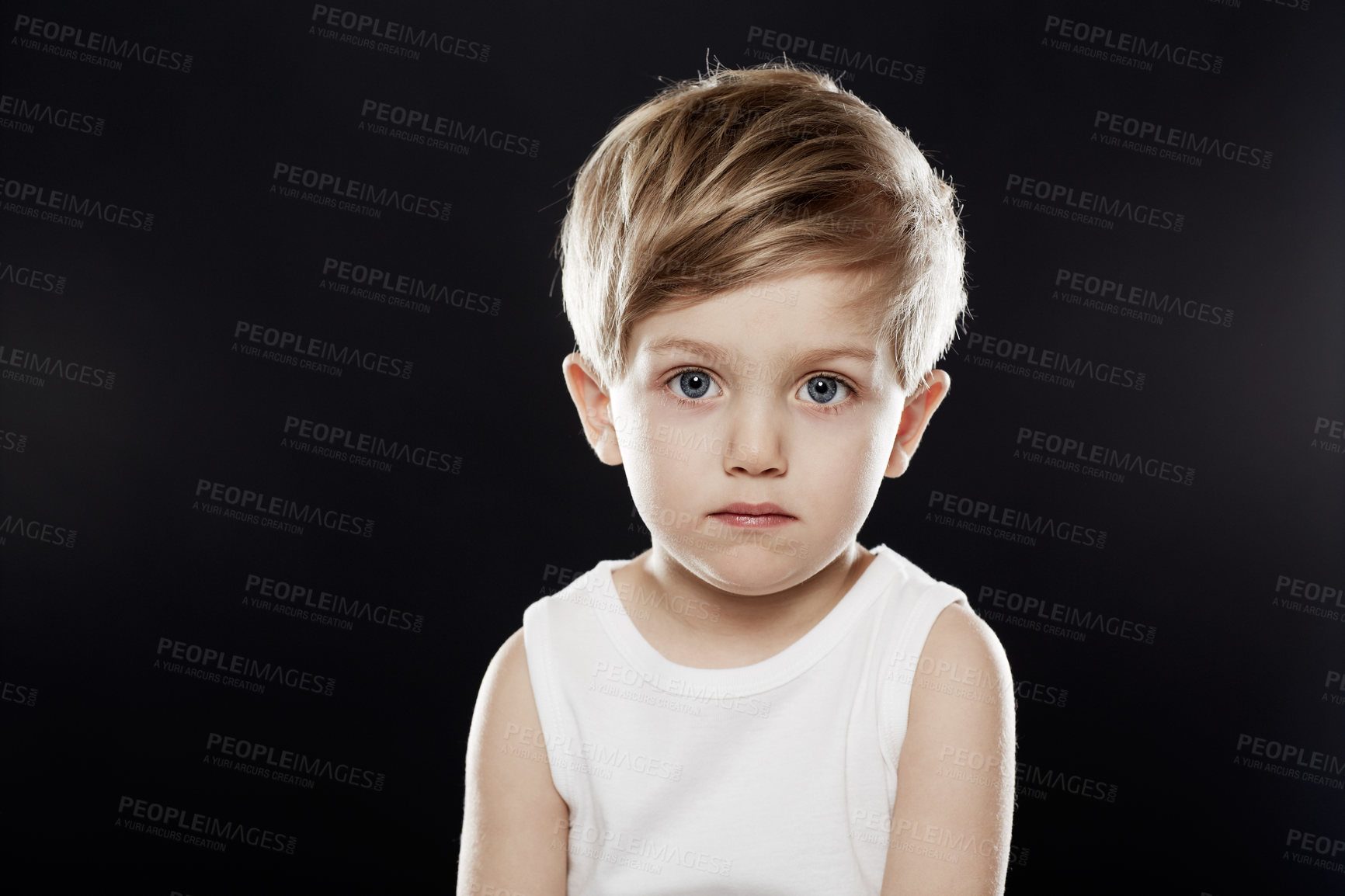 Buy stock photo A cute little boy looking at the camera