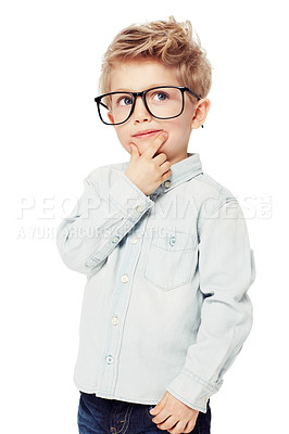 Buy stock photo A sweet little boy wearing glasses looking thoughtful