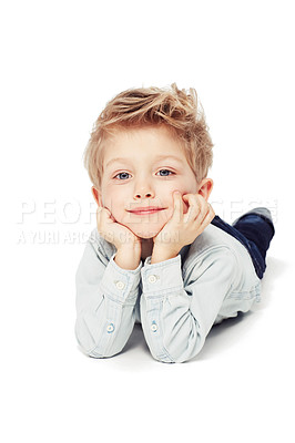 Buy stock photo Portrait, smile and boy lying down, relax and cheerful kid isolated against white studio background. Face, male child or young person with happiness, casual and chilling with joy, happy and confident