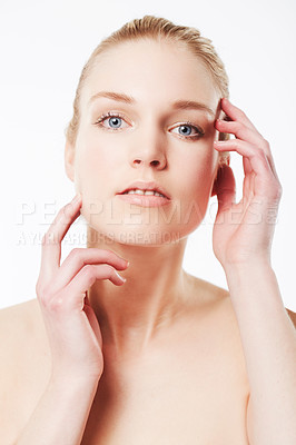 Buy stock photo Portrait of model, touching face or beauty for wellness with cosmetics, aesthetic or healthy glow. Facial dermatology, studio or confident woman with pride or skincare results on white background 