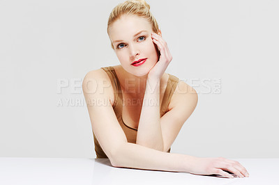 Buy stock photo Portrait of a smiling model against a white background