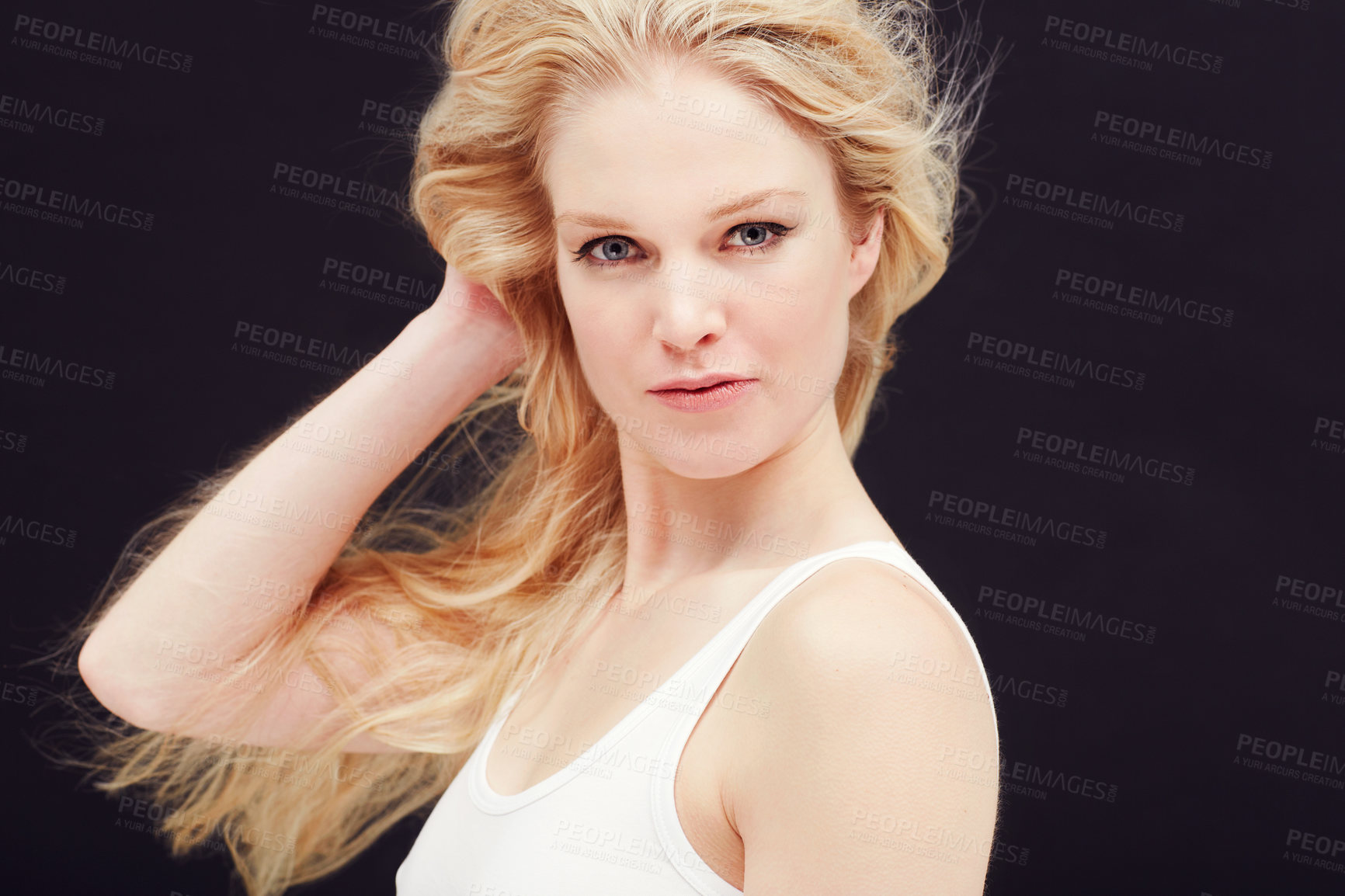 Buy stock photo Beauty, fashion and portrait of woman with hair, smile on face isolated on black background with mock up. Skincare, makeup and creative, luxury aesthetic pose and model in Germany looking in studio.