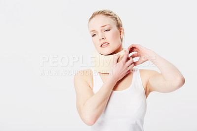 Buy stock photo Sad, uncomfortable and woman thinking of accident with a neck brace isolated on a white background. Depressed, frustrated and girl with medical whiplash pain, muscle and spine injury on a backdrop