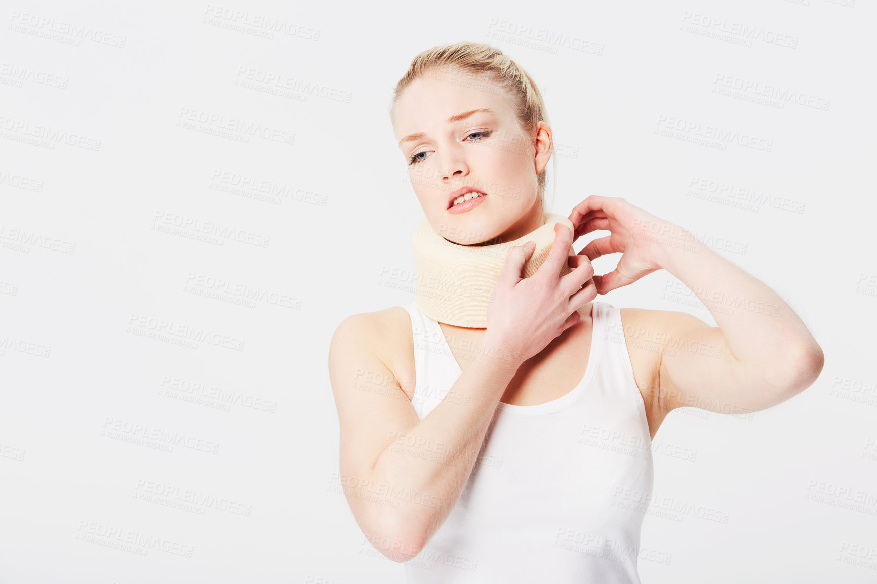 Buy stock photo Sad, uncomfortable and woman thinking of accident with a neck brace isolated on a white background. Depressed, frustrated and girl with medical whiplash pain, muscle and spine injury on a backdrop
