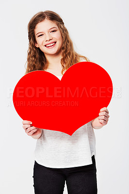 Buy stock photo Red heart, love and portrait of girl in studio for peace, self love and affection on white background. Shape, emoji and face of teenager holding cardboard sign, loving and gesture with mockup  