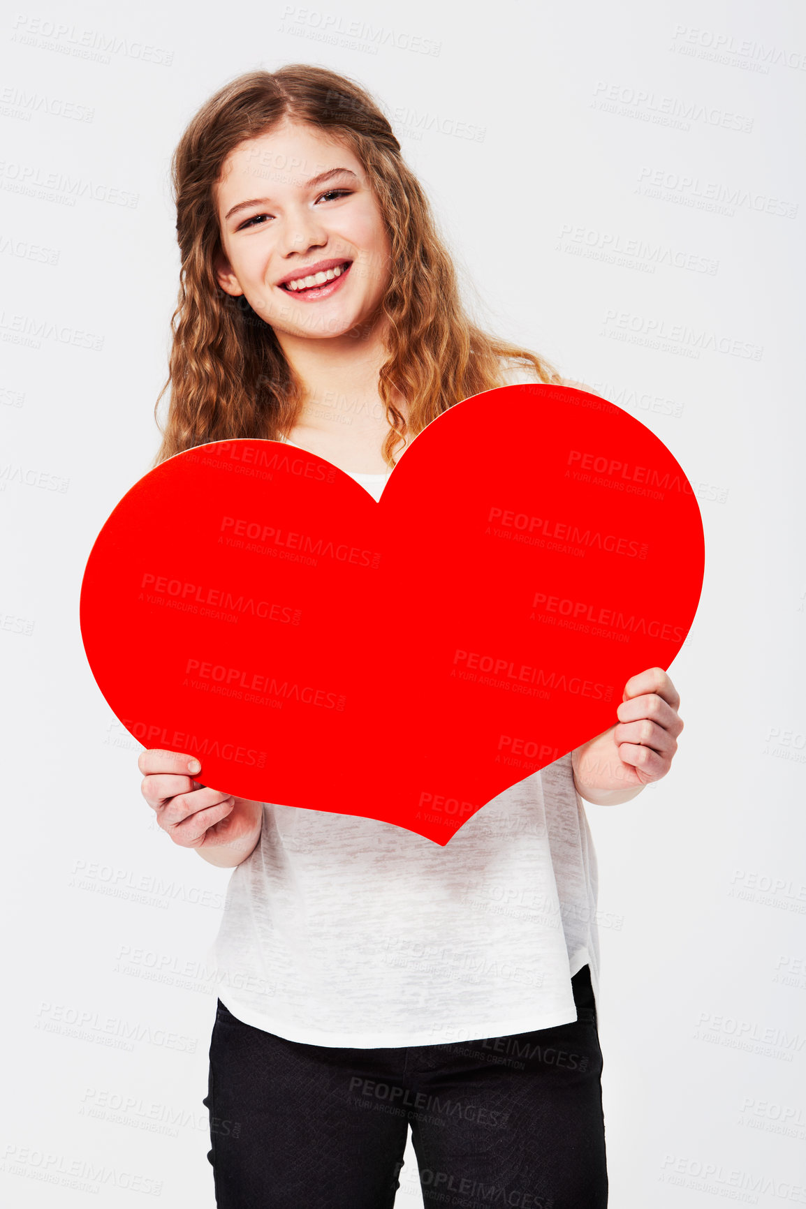 Buy stock photo Red heart, love and portrait of girl in studio for peace, self love and affection on white background. Shape, emoji and face of teenager holding cardboard sign, loving and gesture with mockup  