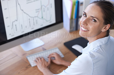 Buy stock photo Portrait, business and happy woman at computer with graphs, stock market trading and data analysis. Female worker, typing and desktop for research, analytics and planning infographics for kpi review 