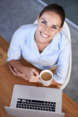 Buy stock photo Portrait, business woman and coffee at laptop for break from planning online research at desk from above. Happy employee, office worker and lady drinking tea, beverage and mug at computer in company 