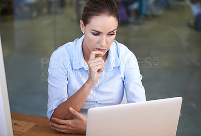 Buy stock photo Business woman, thinking and focused at laptop to research ideas, brainstorming solution and online planning. Serious female worker at computer for insight, reading email and review tech information