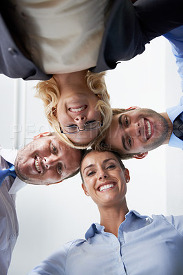 Buy stock photo Portrait, below and happy business people in circle, corporate collaboration and professional support. Teamwork, face and head together of confident employees, staff motivation and pride about us 