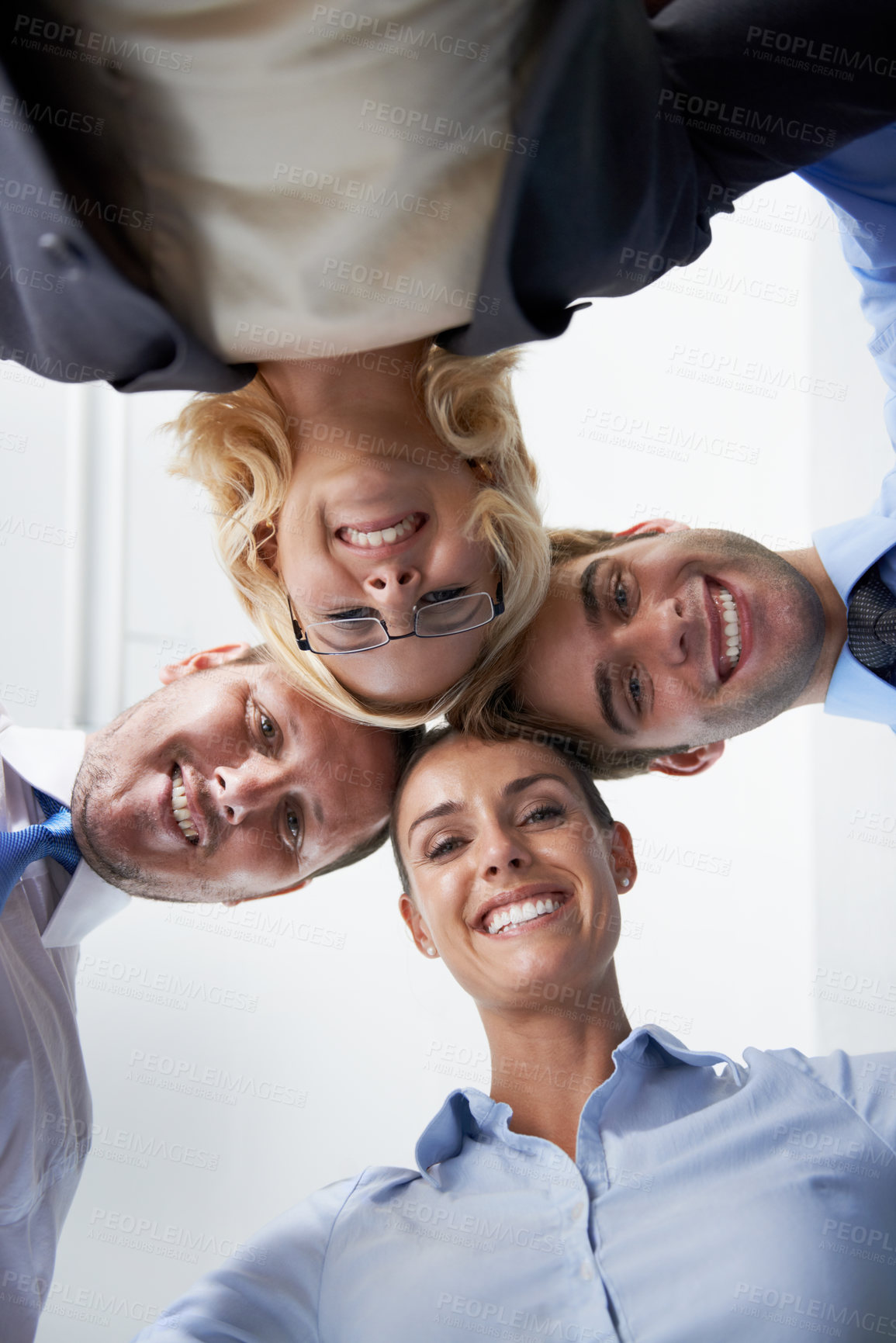 Buy stock photo Portrait, below and happy business people in circle, corporate collaboration and professional support. Teamwork, face and head together of confident employees, staff motivation and pride about us 