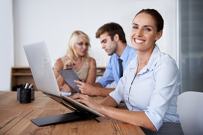 Buy stock photo Portrait of business woman in coworking space with laptop, confidence or job in market research. Teamwork, professional people and happy project manager at desk with smile on face at staff workshop.