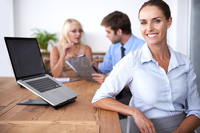 Buy stock photo Portrait of woman manager in coworking space with laptop, confidence and happy career in market research. Teamwork, professional business people and project management at desk with smile on face.