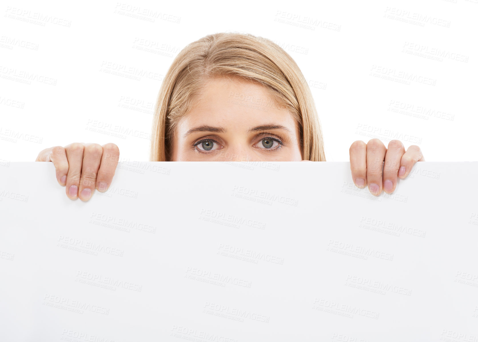 Buy stock photo Empty, banner and woman with sign or poster for announcement in white background and mock up. Studio, space and person with a blank signage for information on paper cardboard or news billboard