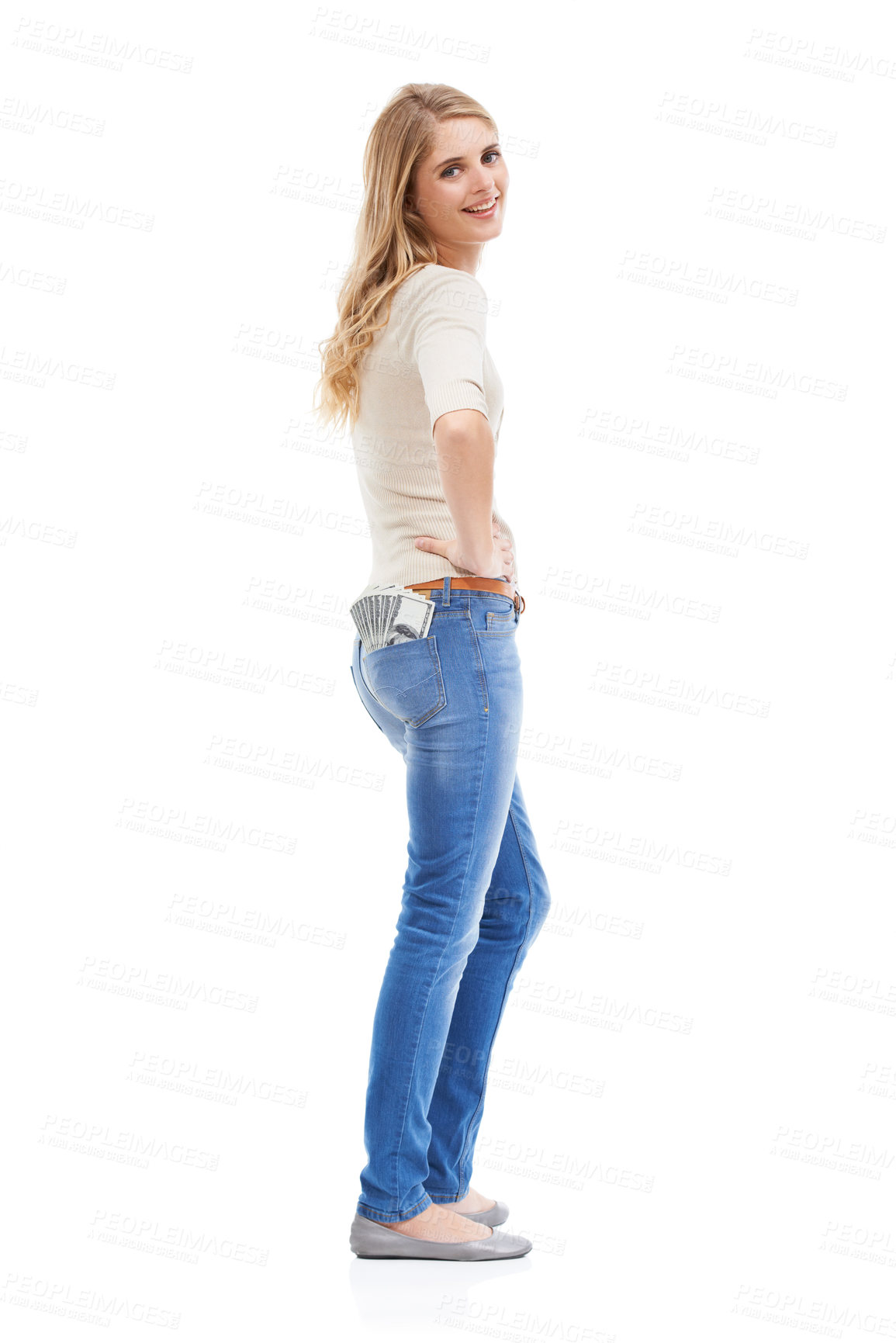 Buy stock photo Portrait, woman and money in jeans pocket for financial freedom, gambling and lottery bonus in studio on white background. Happy winner with cashback savings, wealthy investment and finance in pants