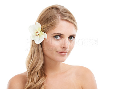 Buy stock photo Woman, portrait and smile in studio with flower, confidence and pride for cosmetic treatment. Model, person or face with mockup for haircare or aesthetic with organic skincare on white background