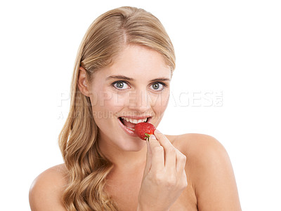 Buy stock photo Woman, eating strawberry for beauty and health, portrait and natural cosmetics with dermatology on white background. Skincare, wellness and self care with fruit, nutrition and vegan product in studio