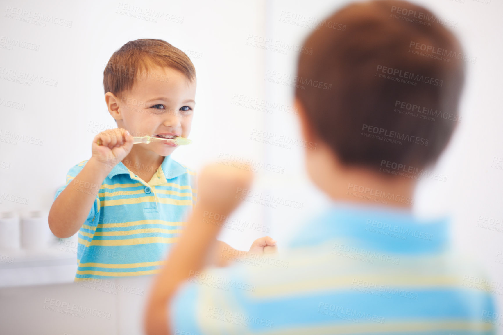 Buy stock photo Boy kid, brushing teeth and mirror in bathroom for cleaning, hygiene or health for routine in house. Child, toothbrush or reflection for dental wellness, thinking or results in morning at family home