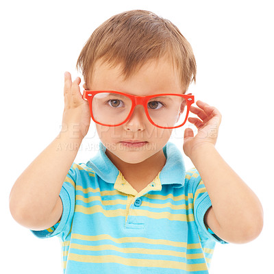 Buy stock photo Child, boy and cool frames or glasses in studio, eyes and vision support by white background. Male person, kid and ophthalmology for eyecare, red spectacles and stylish fashion by backdrop for fun