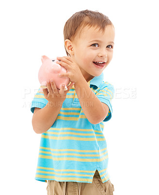 Buy stock photo Child, boy and piggy bank for money, saving and smiling in studio by white background. Happy male person, boy and moneybox for future, investing and cash growth in container, coin and security
