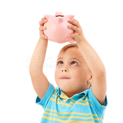 Buy stock photo Kid, boy and piggy bank for change, money box and checking savings in studio by white background. Male person, child and planning for future, investing and cash growth in container, coin and security