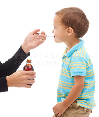 Buy stock photo Hands, medicine and spoon for child in studio, care and thinking with drinking by white background. Kid, mother and bottle for healthcare, pharmaceutical product and helping sick boy in profile