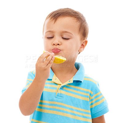Buy stock photo Eating, fruit and portrait of child with lemon in white background, studio and mockup space. Sour, slice and kid with healthy food, nutrition and citrus in diet for wellness and vitamin c benefits