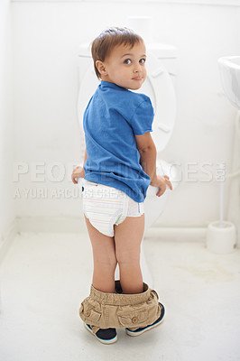 Buy stock photo Shot of a young boy being potty trained