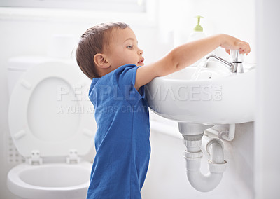 Buy stock photo Child, boy and washing hands in bathroom, hygiene and prevention of germs or bacteria at home. Male person, kid and learning at basin or cleaning and sanitary care, water and disinfection for safety