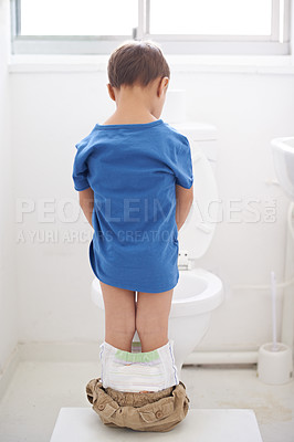 Buy stock photo Boy kid, potty training and toilet with thinking, diaper and pants on floor for learning, development and progress. Child, family home and back in bathroom with ideas, hygiene or solution with nappy