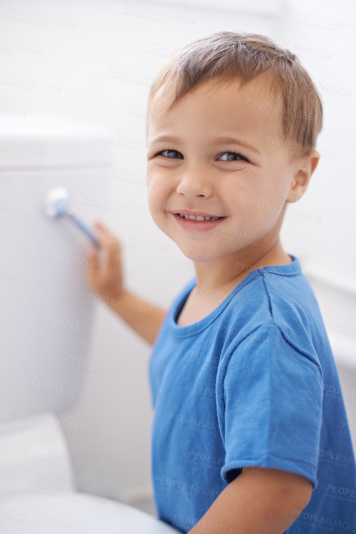 Buy stock photo Boy child, flush toilet and potty training for smile, portrait or pride for development in family home. Kid, bathroom and hygiene with wellness, cleaning or water for waste, dirt or bacteria in house