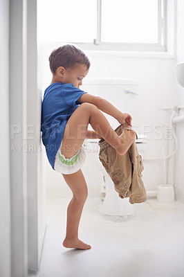 Buy stock photo Child, bathroom and toilet training for learning growth, milestone or hygiene. Male person, kid diaper and pants or step for development in home for parent care for toddler teaching, health or love