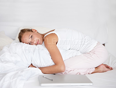 Buy stock photo Woman, remote work and relax in portrait on bed with happiness, comfort and pillow. Morning, bedroom and calm person hugging duvet with a smile for nap or rest in apartment with project and laptop