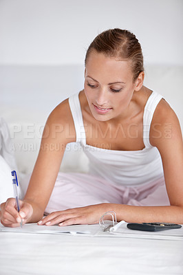 Buy stock photo Woman, calculator and financial budget in bed for accounting, saving or expenses. Female person, notebook and notepad in apartment for money growth or income tax for loan, investment or organization