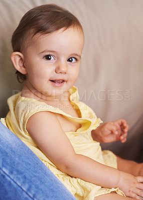 Buy stock photo Baby, portrait and sitting on couch, child development and infant growth with face, happy and home. Girl, joyful and healthy in good mood, childhood and cheerful with enthusiasm, kid and adorable 
