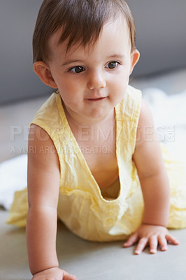 Buy stock photo Baby, crawling and playing on floor, child development and infant growth with casual, coordination and home. Girl, cognition or healthy in good mood, childhood or balance with arms, kid or adorable
