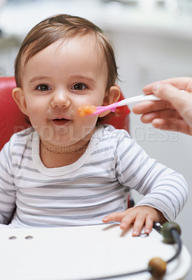 Buy stock photo Eating, sweet and portrait of baby in chair with vegetable food for child development at home. Cute, nutrition and hungry boy kid or toddler enjoying healthy lunch, dinner or supper meal at house.