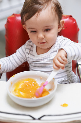 Buy stock photo Baby, high chair and bowl for meal, nutrition or healthy porridge with spoon to eat food at home. Young adorable cute little child, kid or toddler playing with snack for hunger, vitamins or nutrients