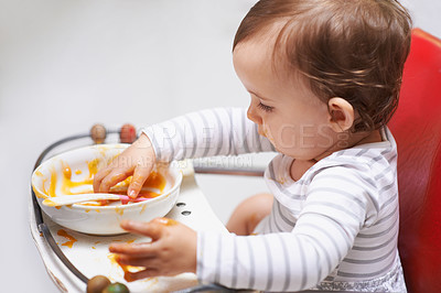 Buy stock photo Eating, puree and girl baby in chair with vegetable food for child development at home. Cute, nutrition and hungry young  kid or toddler enjoying healthy lunch, dinner or supper meal at house.