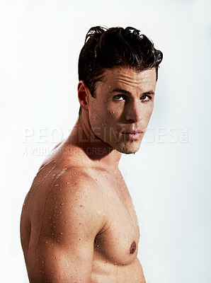 Buy stock photo Shower, sexy and portrait of man with water for washing, cleaning and skincare wellness. Body, hot and muscular male model person with grooming and hygiene for healthy skin by white studio background
