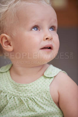 Buy stock photo Baby, kid and girl play in home, adorable and cute child closeup alone in house. Young blonde toddler, innocent and childhood development for learning, education and thinking in kindergarten nursery
