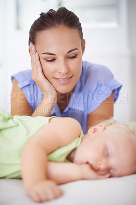 Buy stock photo Sweet, sleeping and mother with baby on bed for bonding, relax and happy cute relationship. Love, smile and young mom watching girl child, kid or toddler taking a nap in bedroom or nursery at home.