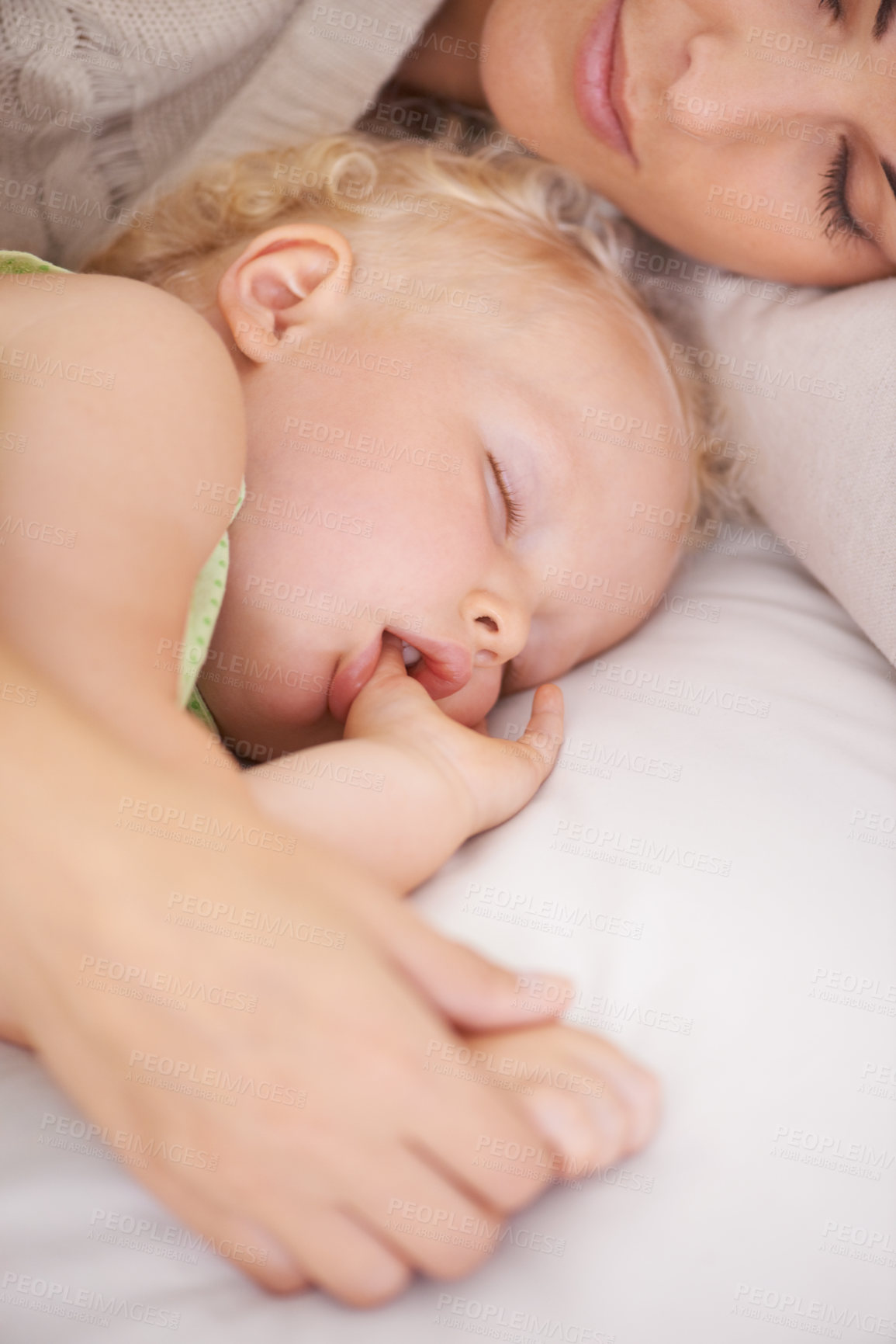 Buy stock photo Mother, baby and kid suck thumb in home, adorable and cute innocent child with parent in house. Young blonde toddler, finger and mouth of healthy little girl sleeping in bedroom together with mama