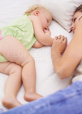 Buy stock photo Love, sleeping and mom with toddler on bed for bonding, relax and sweet cute family time. Happy, smile and young mother watching girl child, kid or baby taking a nap in bedroom or nursery at home.