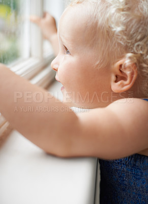 Buy stock photo Girl, window and baby with smile standing against glass or wall in family home learning to walk. Happy, female toddler and young cute kid at house with childhood development or natural growth alone