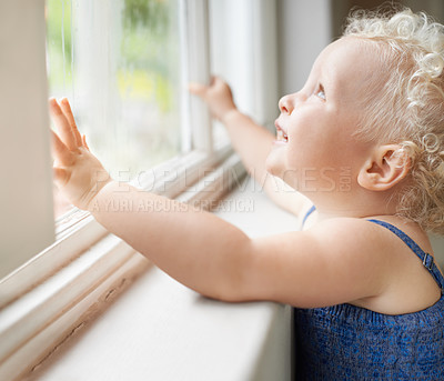 Buy stock photo Happy, window and toddler with smile standing against glass or wall in family home learning to walk. Girl, female baby and young cute kid at house with childhood development or natural growth alone