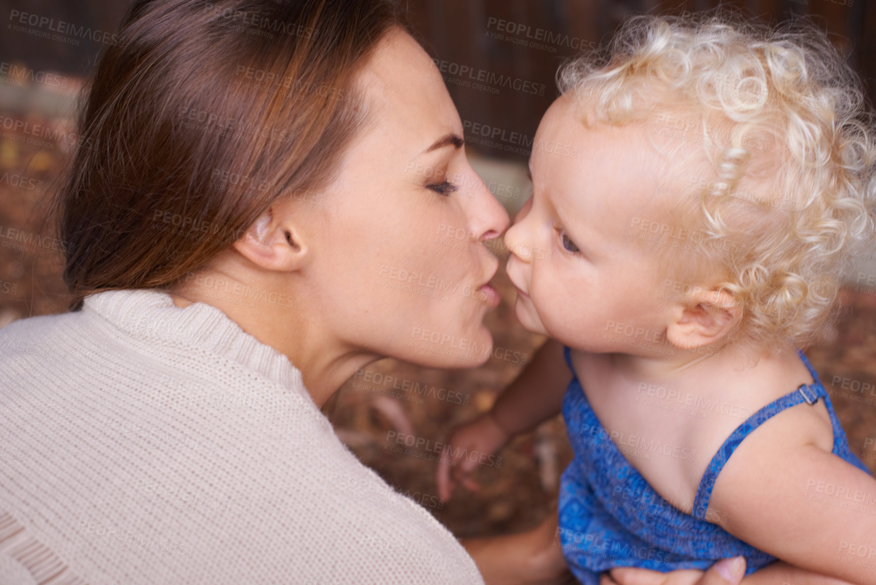 Buy stock photo Mother, love and kiss of baby in house, trust and parent support for mama bond with happiness in care. Woman, nurture and toddler daughter with together, wellness and hug kid for bonding in apartment