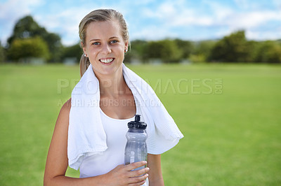 Buy stock photo Happy woman, portrait and bottle of water with towel for exercise, workout or outdoor training in fitness. Female person or athlete smile for drink, natural sustainability or health and wellness